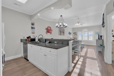 This furnished 3-bedroom, 2-bath coastal, condo residence is