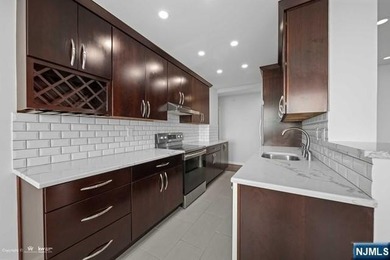 *Presented by Wendy Gamez * Totally renovated condo residence at