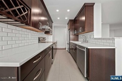 *Presented by Wendy Gamez * Totally renovated condo residence at