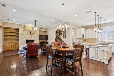 Step into luxury with this pristine custom Highland home