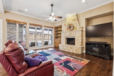 Step into luxury with this pristine custom Highland home