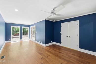 Tucked away on 5 private wooded acres with a peaceful pond, this - photo 15