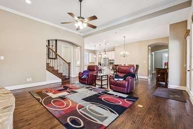 Step into luxury with this pristine custom Highland home