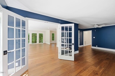 Tucked away on 5 private wooded acres with a peaceful pond, this - photo 16