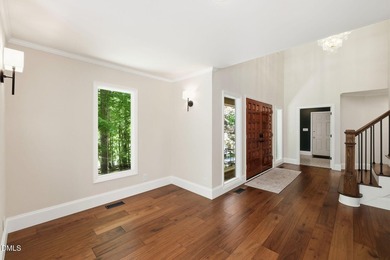 Tucked away on 5 private wooded acres with a peaceful pond, this - photo 20
