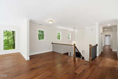 Tucked away on 5 private wooded acres with a peaceful pond, this - photo 23