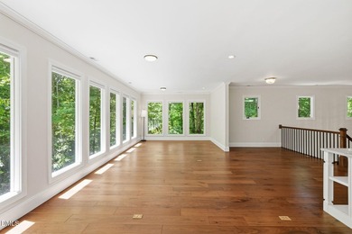 Tucked away on 5 private wooded acres with a peaceful pond, this - photo 24