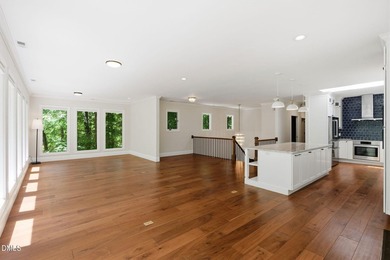Tucked away on 5 private wooded acres with a peaceful pond, this - photo 25