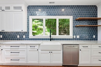 Tucked away on 5 private wooded acres with a peaceful pond, this - photo 31