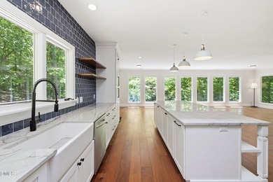 Tucked away on 5 private wooded acres with a peaceful pond, this - photo 32