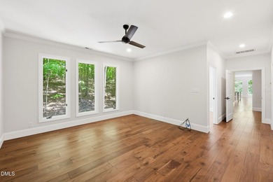 Tucked away on 5 private wooded acres with a peaceful pond, this - photo 37