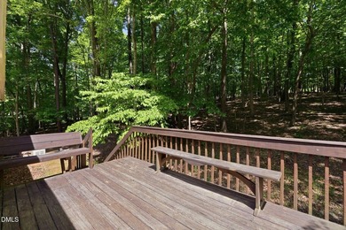 Tucked away on 5 private wooded acres with a peaceful pond, this - photo 48