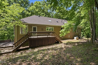 Tucked away on 5 private wooded acres with a peaceful pond, this - photo 49