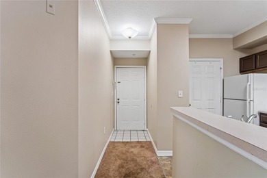 A top floor corner 3 bed 2 full bath unit in a gated community - photo 6