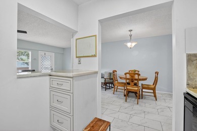 Move right into this updated 1 bed, 1.5 bath 3rd-floor condo in - photo 14