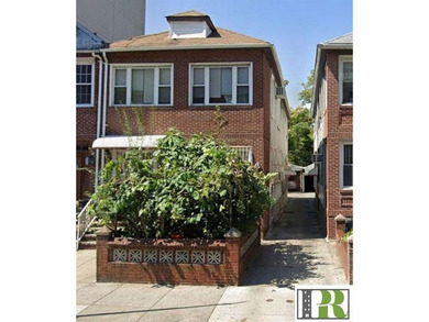 This semi-detached 2-family property sits on a 24x125 lot and - photo 1