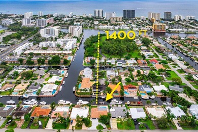 BOATER'S DREAM HOME AWAITS! NO FIXED BRIDGES! Exceptional - photo 1