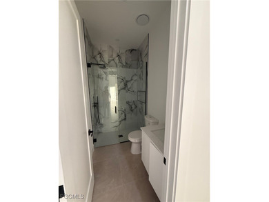STEP INTO MODERN LUXURY in this stunning BRAND-NEW CONSTRUCTION - photo 3