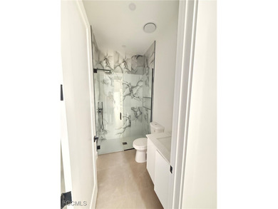 STEP INTO MODERN LUXURY in this stunning BRAND-NEW CONSTRUCTION - photo 4