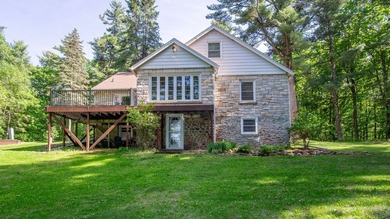 Nestled among towering pines and hardwoods on picturesque Two - photo 3