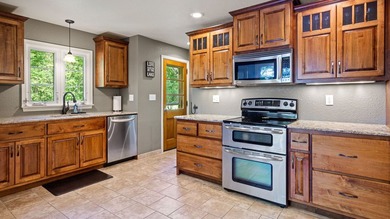 Nestled among towering pines and hardwoods on picturesque Two - photo 4