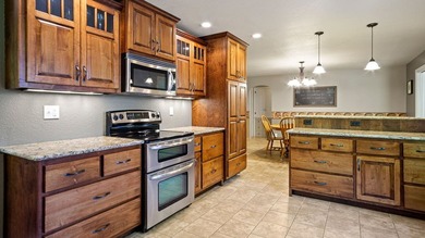 Nestled among towering pines and hardwoods on picturesque Two - photo 6