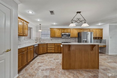 This beautiful, 4-bedroom brick home offers numerous updates and - photo 8