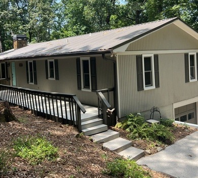 Enjoy Peak Privacy with Seasonal Mountain & Lake Views! This - photo 1