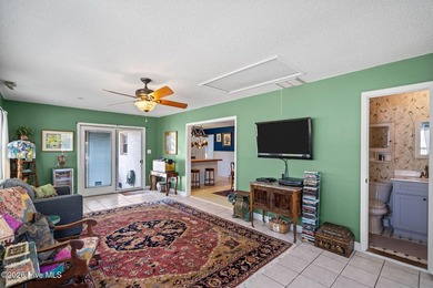 This charming coastal retreat offers 3 bedrooms, 2 full baths - photo 22