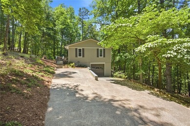 Enjoy Peak Privacy with Seasonal Mountain & Lake Views! This - photo 3