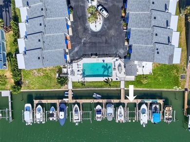 Two-bedroom townhome with deeded boat slip & 10,000 lbs lift in - photo 1