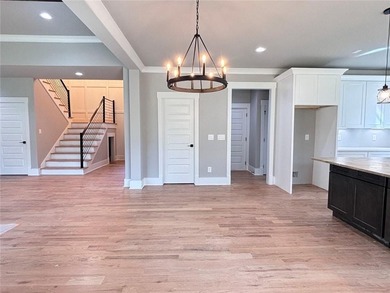 **Stunning New Construction with Owners Suite on Main & Outdoor