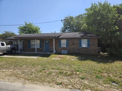 Here's a more casual version: Solid Brick Home in Mary Esther -- - photo 1