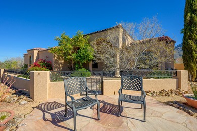 Perched atop a scenic hill in the prestigious Oro Valley Heights