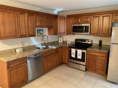 Lake Townhome/Townhouse For Sale in West Palm Beach, Florida