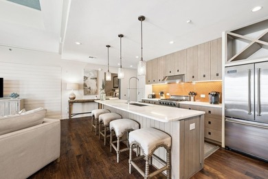 This 3-bedroom, 2-bath condo offers a rare blend of indoor - photo 2
