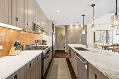 This 3-bedroom, 2-bath condo offers a rare blend of indoor - photo 3