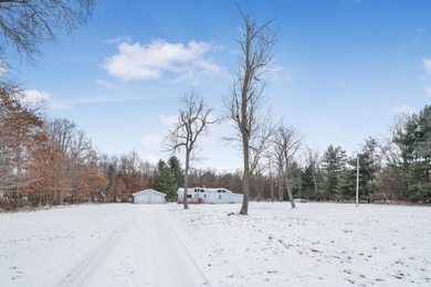 Muskegon River Home Active Under Contract in Evart Michigan