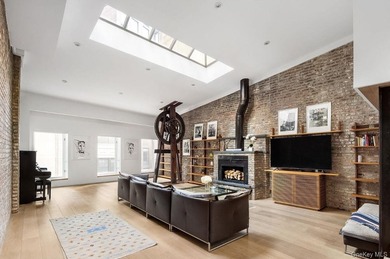 Experience luxurious loft living in this 3-Bedroom + Office - photo 1