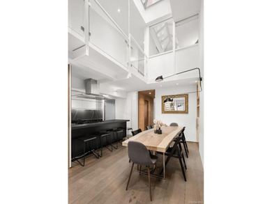 Experience luxurious loft living in this 3-Bedroom + Office - photo 4