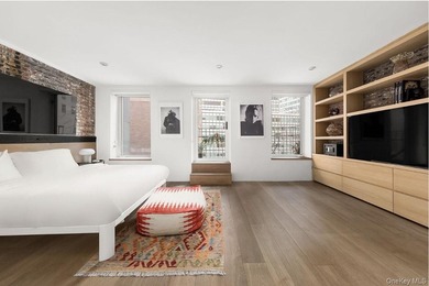 Experience luxurious loft living in this 3-Bedroom + Office - photo 5
