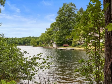 Exceptional 0.84 acre lakefront lot with approximately 86' of - photo 3