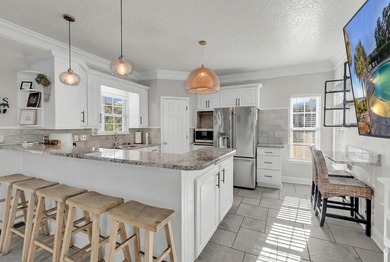 Welcome to your dream beach retreat located within the gates of - photo 4