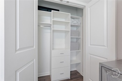 End unit townhome with custom closets and extended paver patio - photo 12