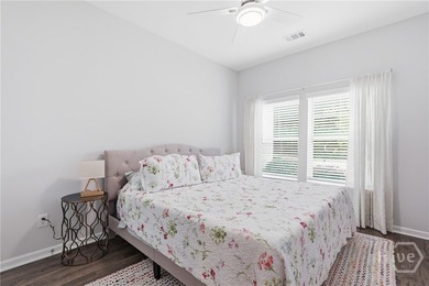 End unit townhome with custom closets and extended paver patio - photo 13