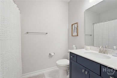 End unit townhome with custom closets and extended paver patio - photo 14