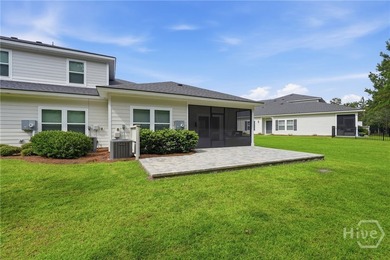 End unit townhome with custom closets and extended paver patio - photo 17