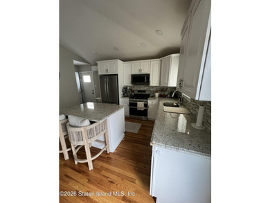 Welcome to this beautifully renovated 3-bedroom ranch that - photo 6