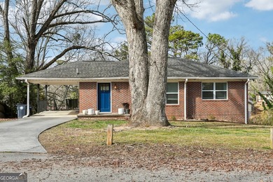 Welcome home to this fully renovated 4-sided brick ranch located - photo 2