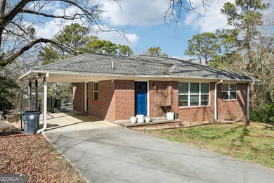 Welcome home to this fully renovated 4-sided brick ranch located - photo 3